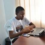 A student with a laptop